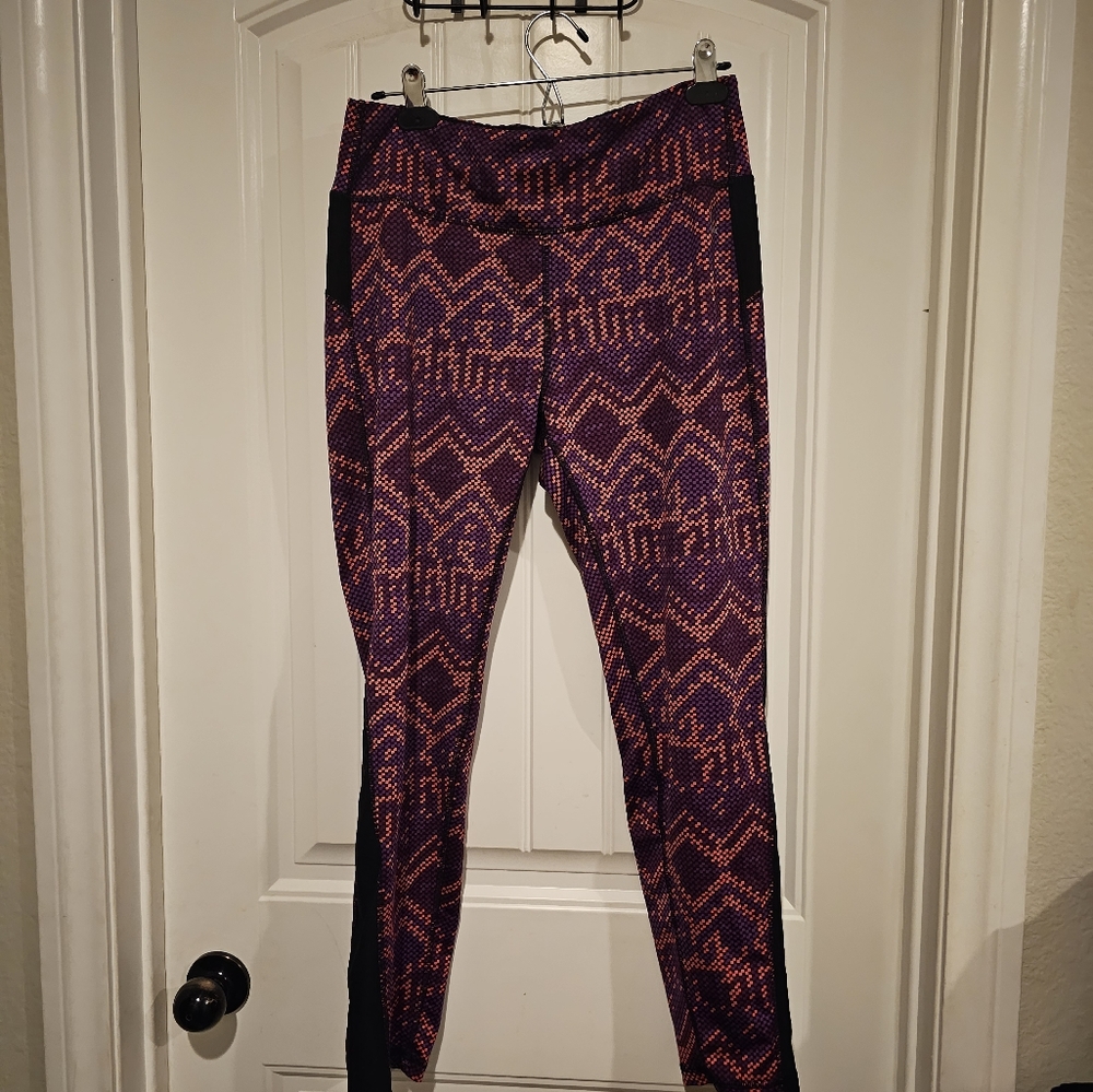 RBX  leggings purple,orange, and black size XL.